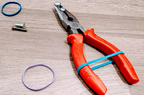 Industrial rubber band use with tools and hardware